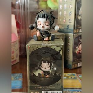 Skull panda figurine